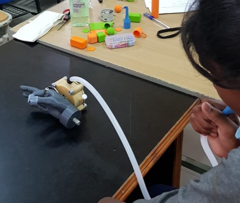 Children learning to use the prosthetic limb