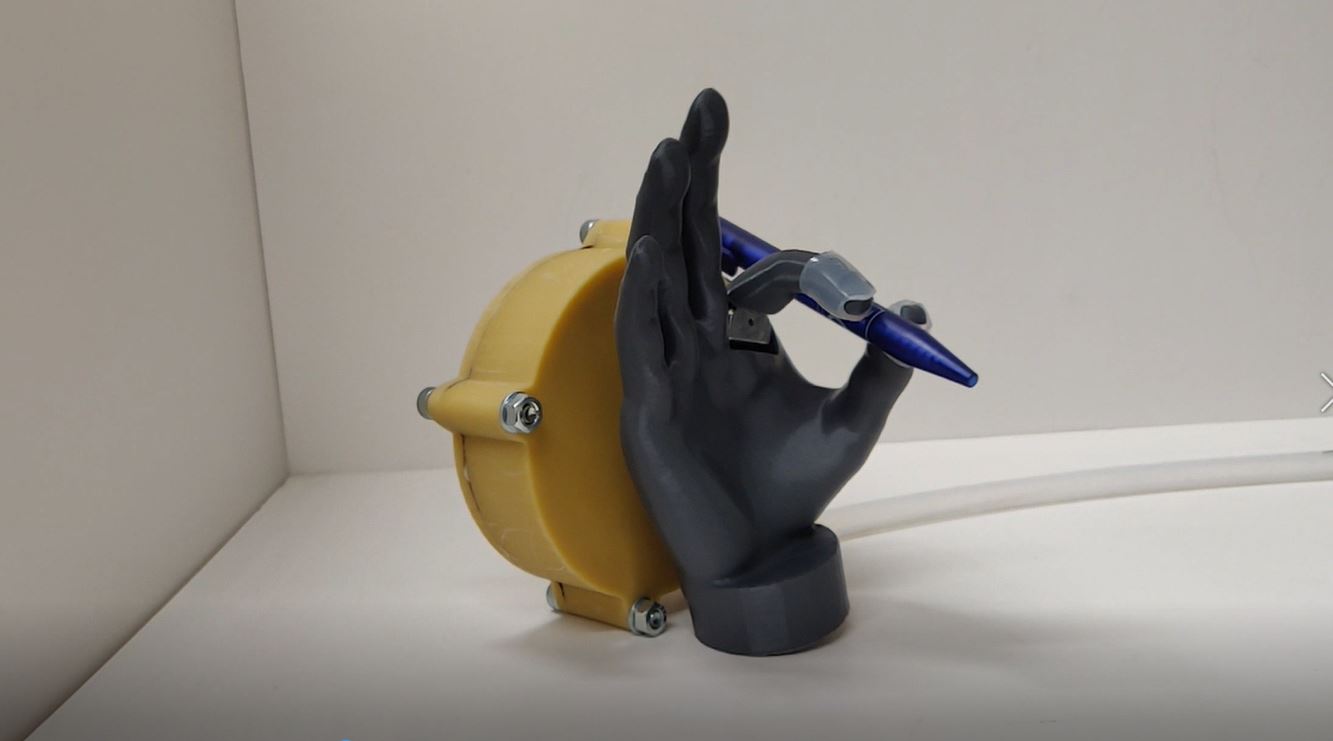 Prosthetic hand holding pen