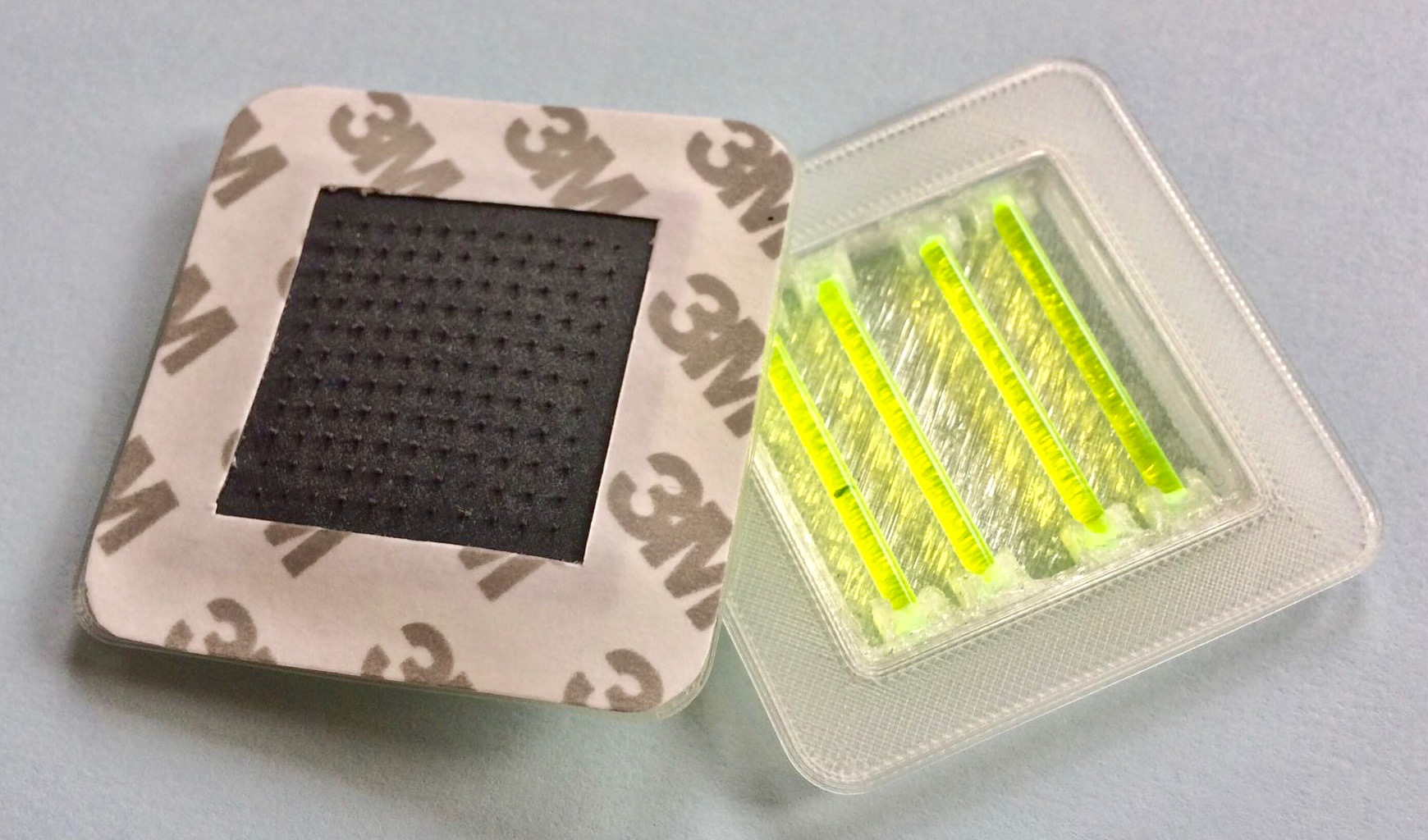 Snapvaccine prototype showing a simple mechanism used in glow sticks, snap mechanism and contained mixing system, with microneedles to deliver the vaccine via a stick-on patch