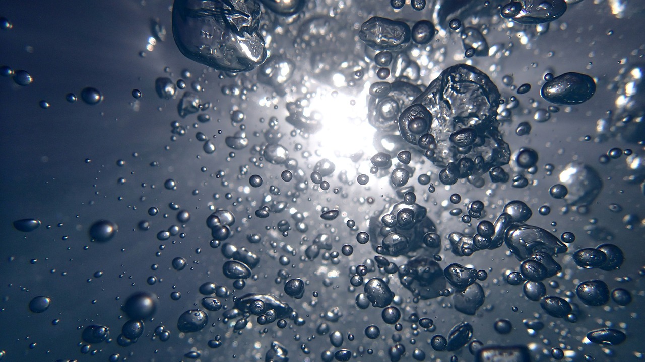Bubbles in water with sunlight