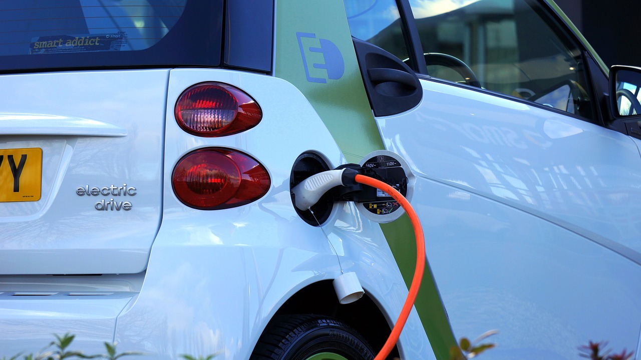 Stock image of electric car being charged