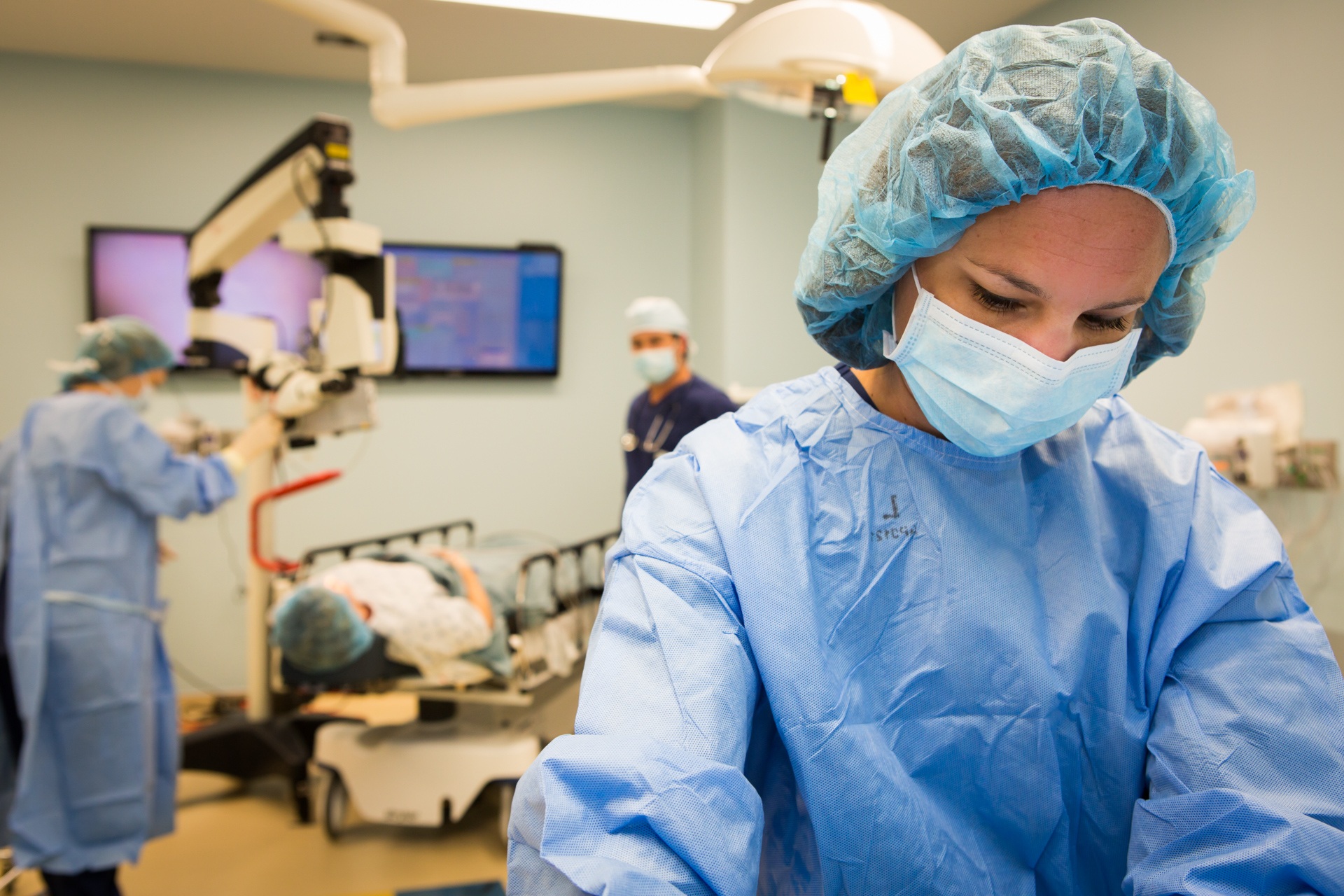 Doctors and patient in operating theatre