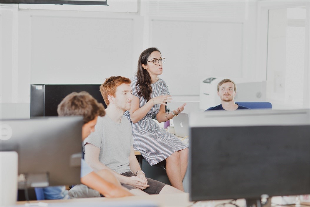 Researchers in classroom at Oxford's Deparment of Engineering Science
