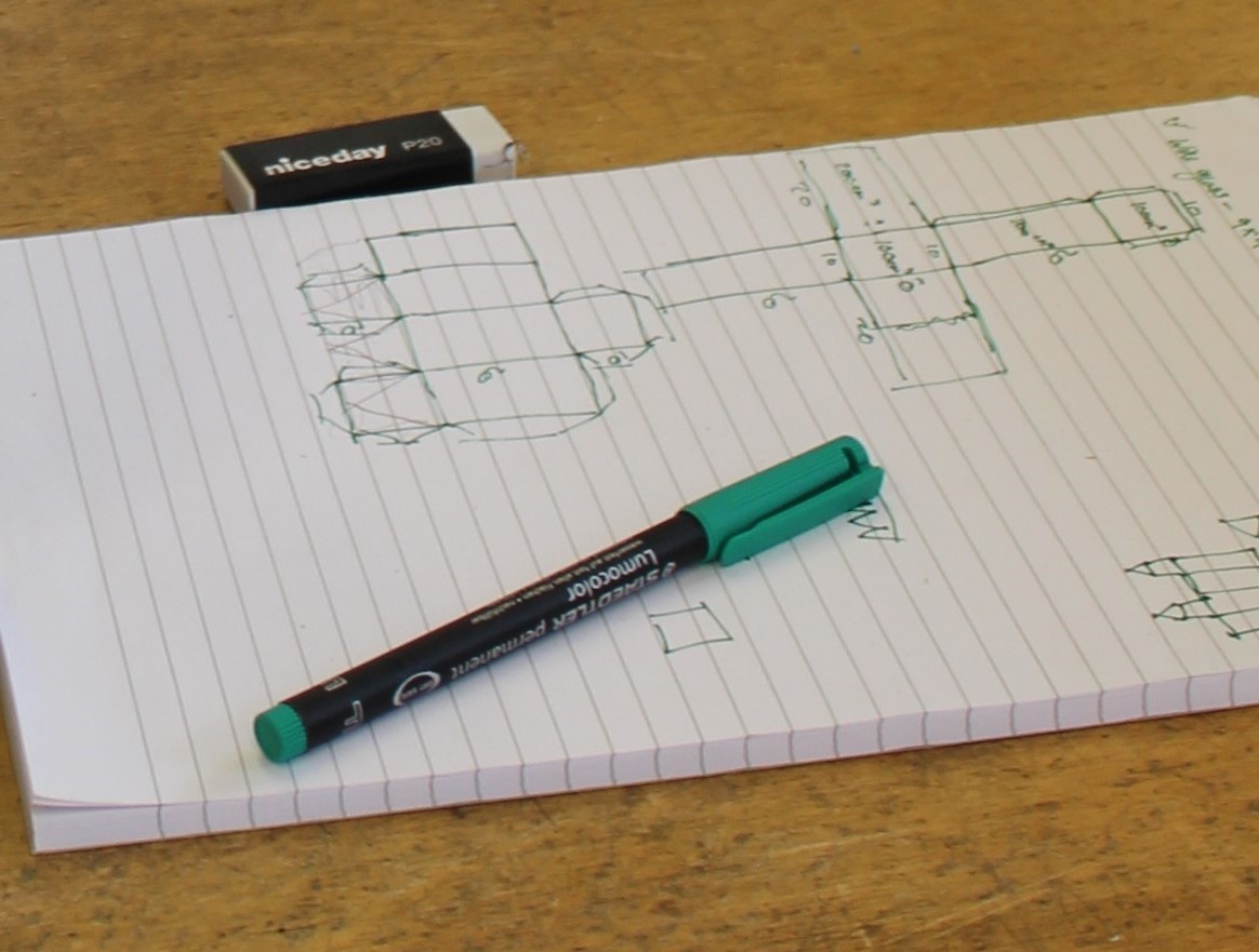 Sketched out diagram on notepad
