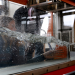 Student using hydraulics lab equipment