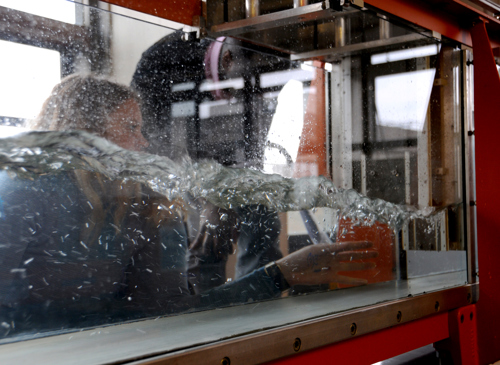 Student using hydraulics lab equipment