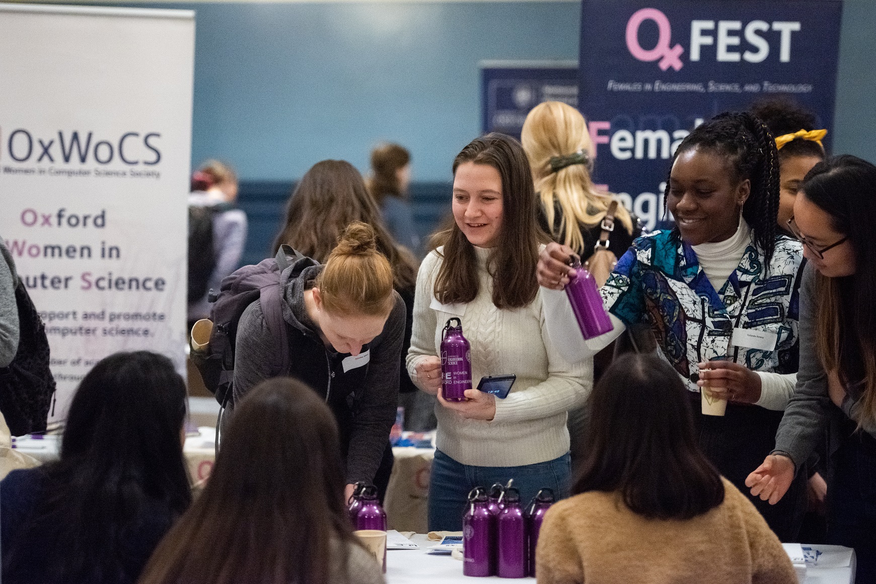 Young female students at stalls at Oxford Women in STEM event, January 2020