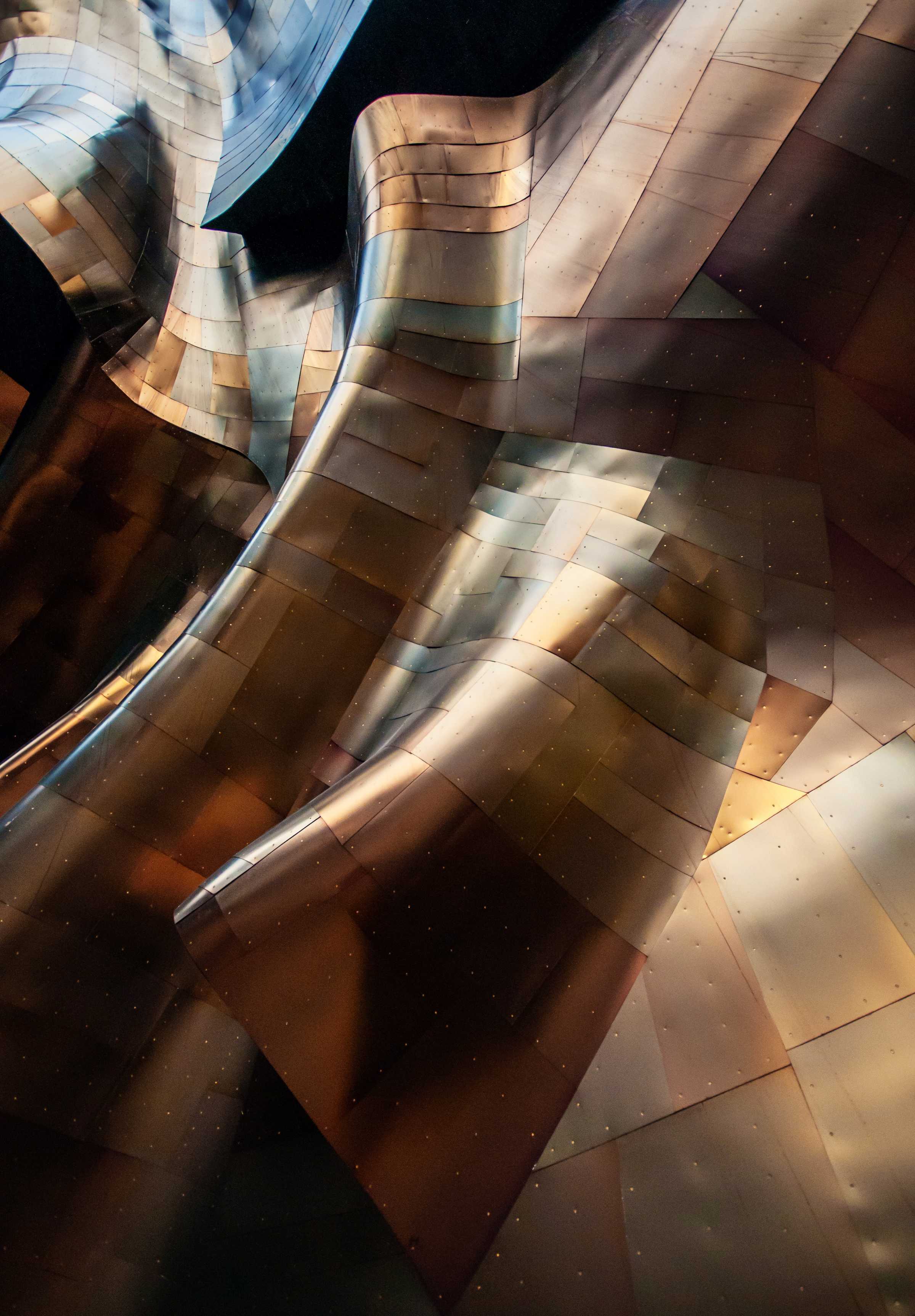 Abstract architectural design of sheet metal shaped in waves