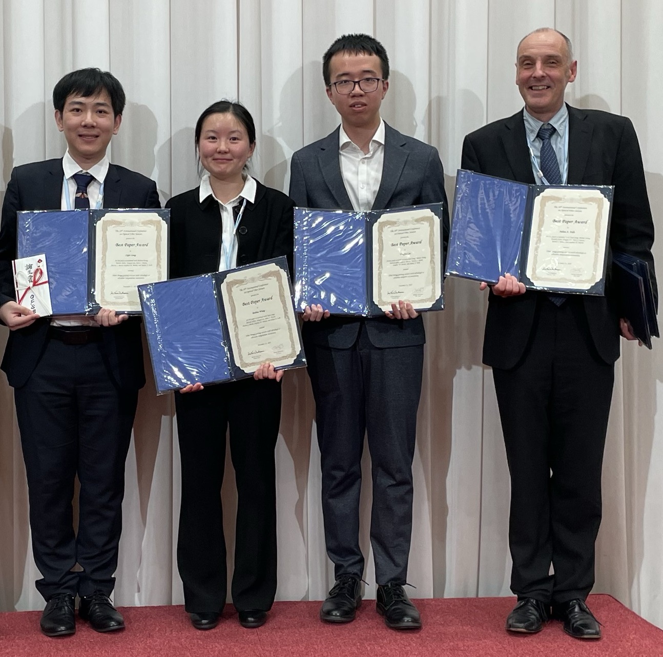 Team With Award Certificates (L R Zipei Song Mohan Wang Tongyu Liu Julian Fells) 