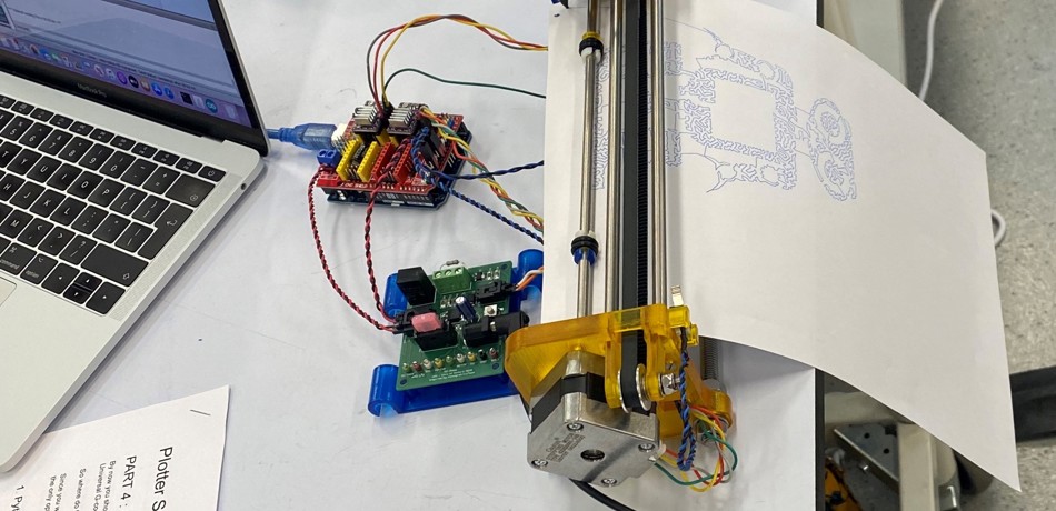 Electric circuit typewriter printing a picture of a robot