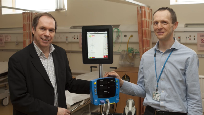 Lionel Tarassenko with a colleague in a hospital ward