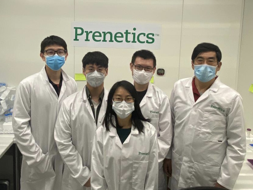 Oxford team of scientists wearing PPE at Heathrow Terminal 5 Covid-19 Test Centre