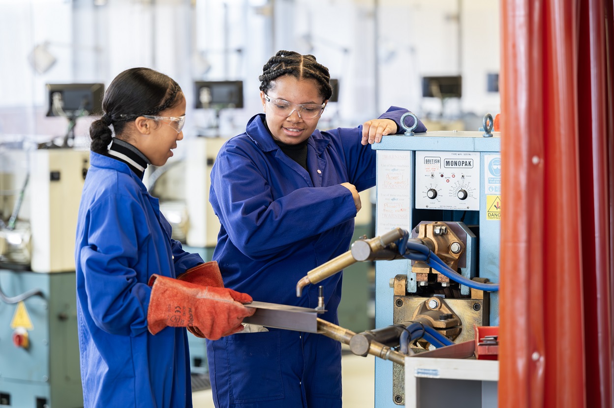 Participants of Access programme Uncover Engineering 2024 working in the Mechanical Lab