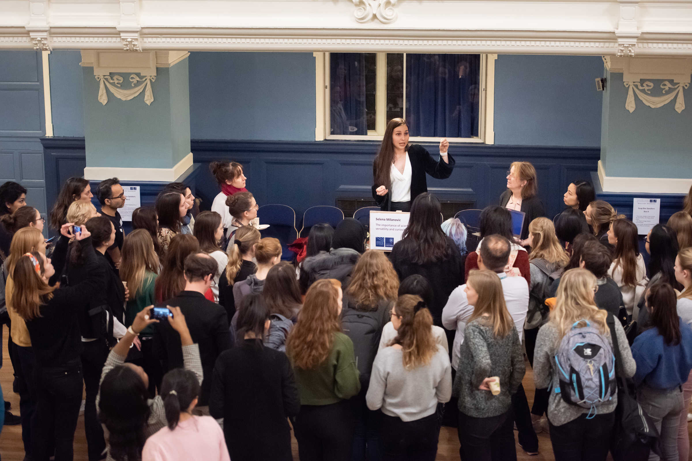 DPhil student Selena Milanovic talks to a room full of people at Women in STEM event at Oxford Town Hall, January 2020.