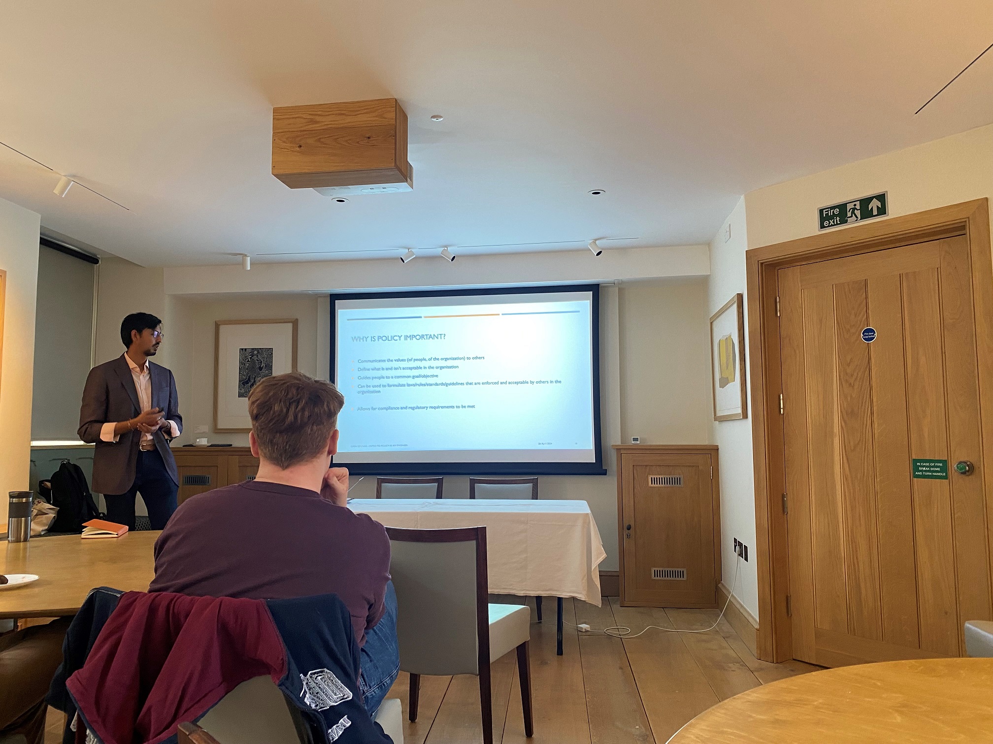 Post-Doctoral Researcher, Dr. Veerle Brans, organises series of policy learning events. Image shows speaker, Mihir Sheth, explaining the importance of policy for researchers.