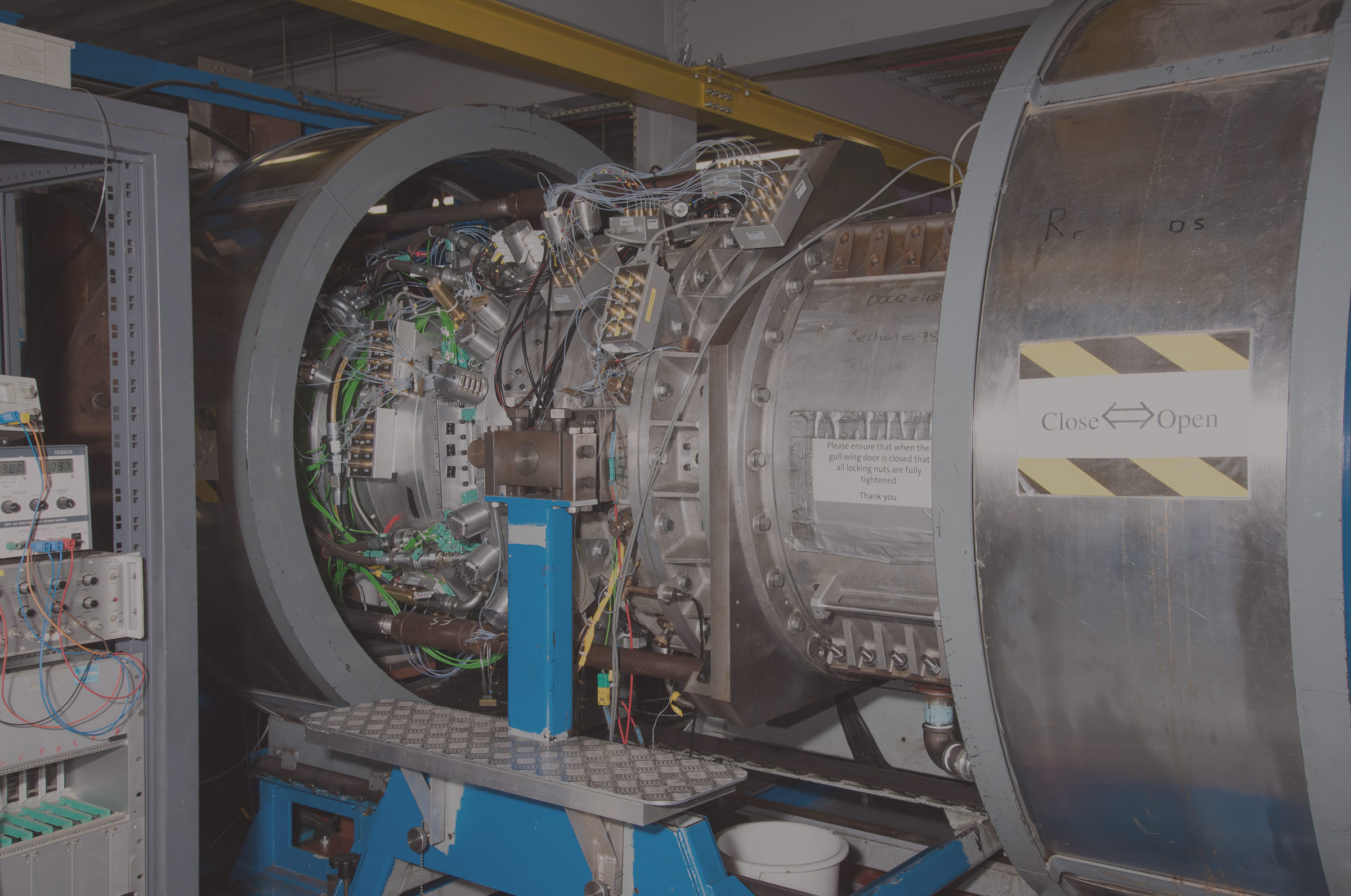 A large metal machine with wires