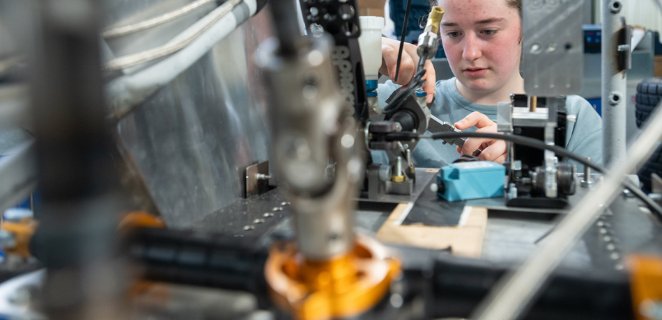 Student working on equipment in the Engineering Science labs