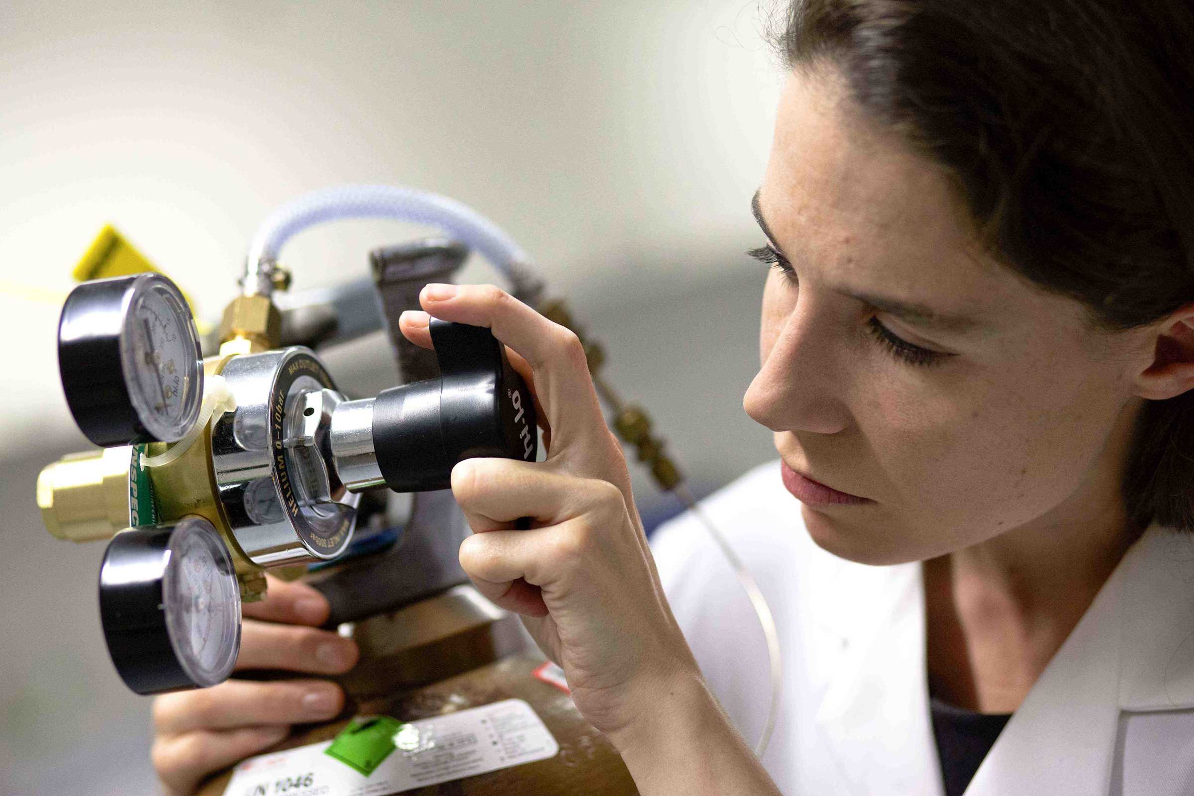 Professor Eleanor Stride with biomedical engineering equipment
