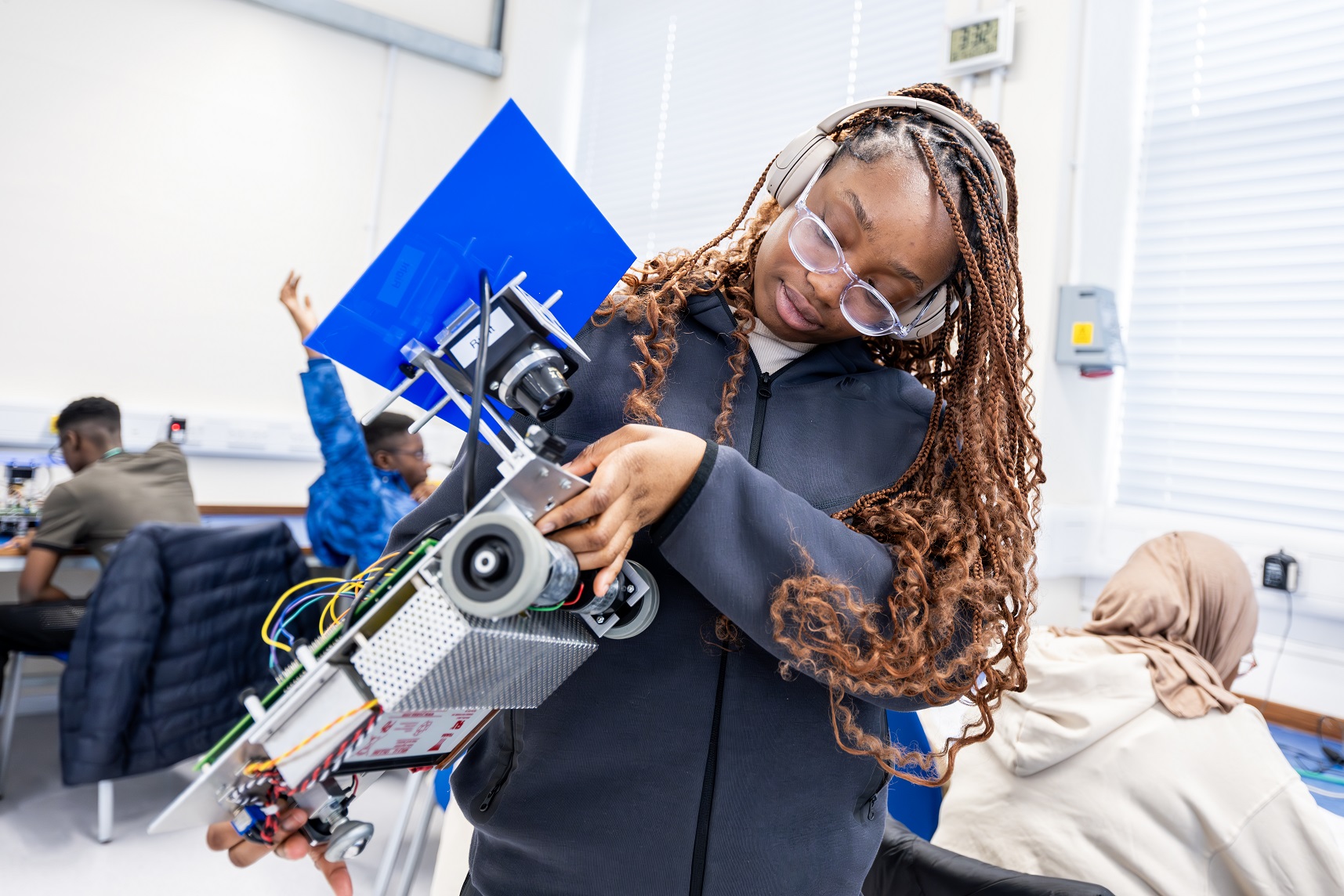 Participants of Access programme Uncover Engineering 2024 doing a Mobile Robots activity